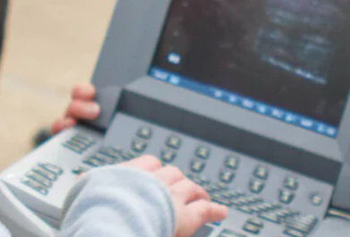 close up of a person using a laptop